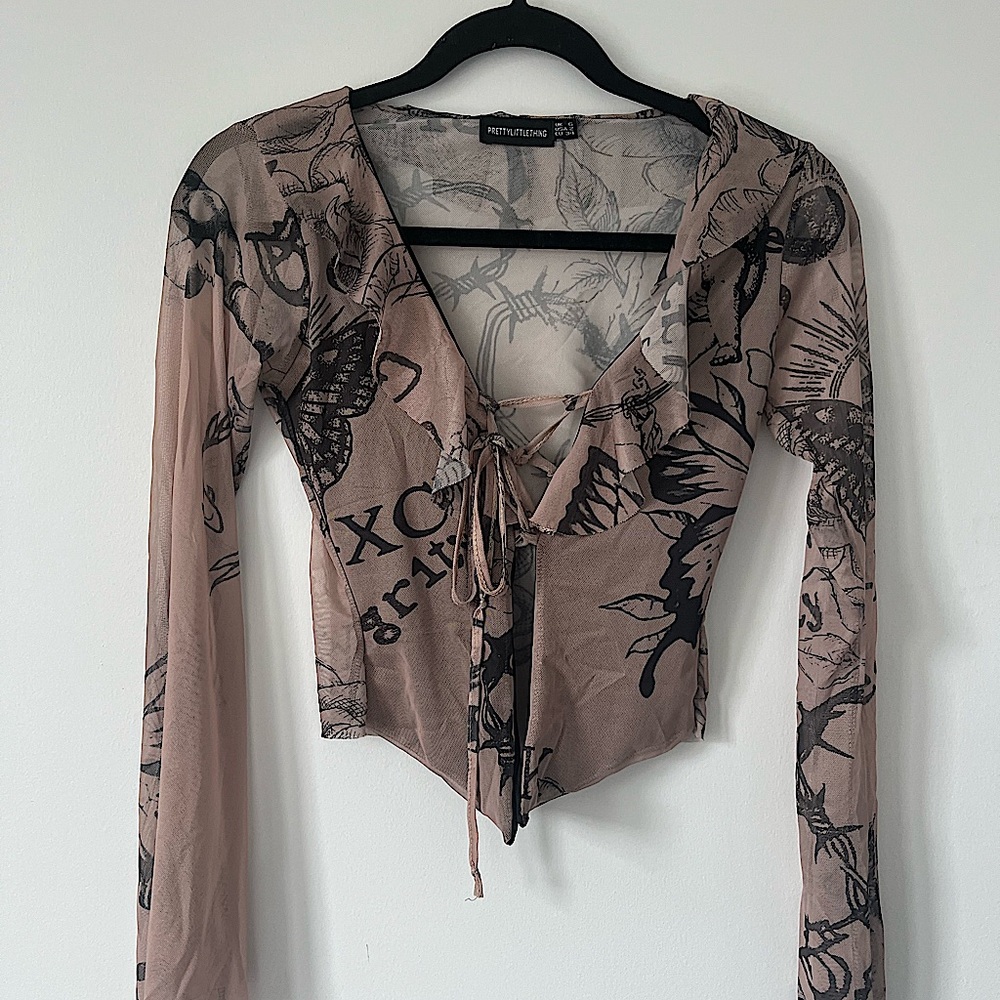 Pretty Little Thing front tie long sleeve graphic top